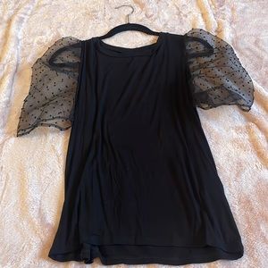 Francesa’s Black top with bubble see-through sleeves